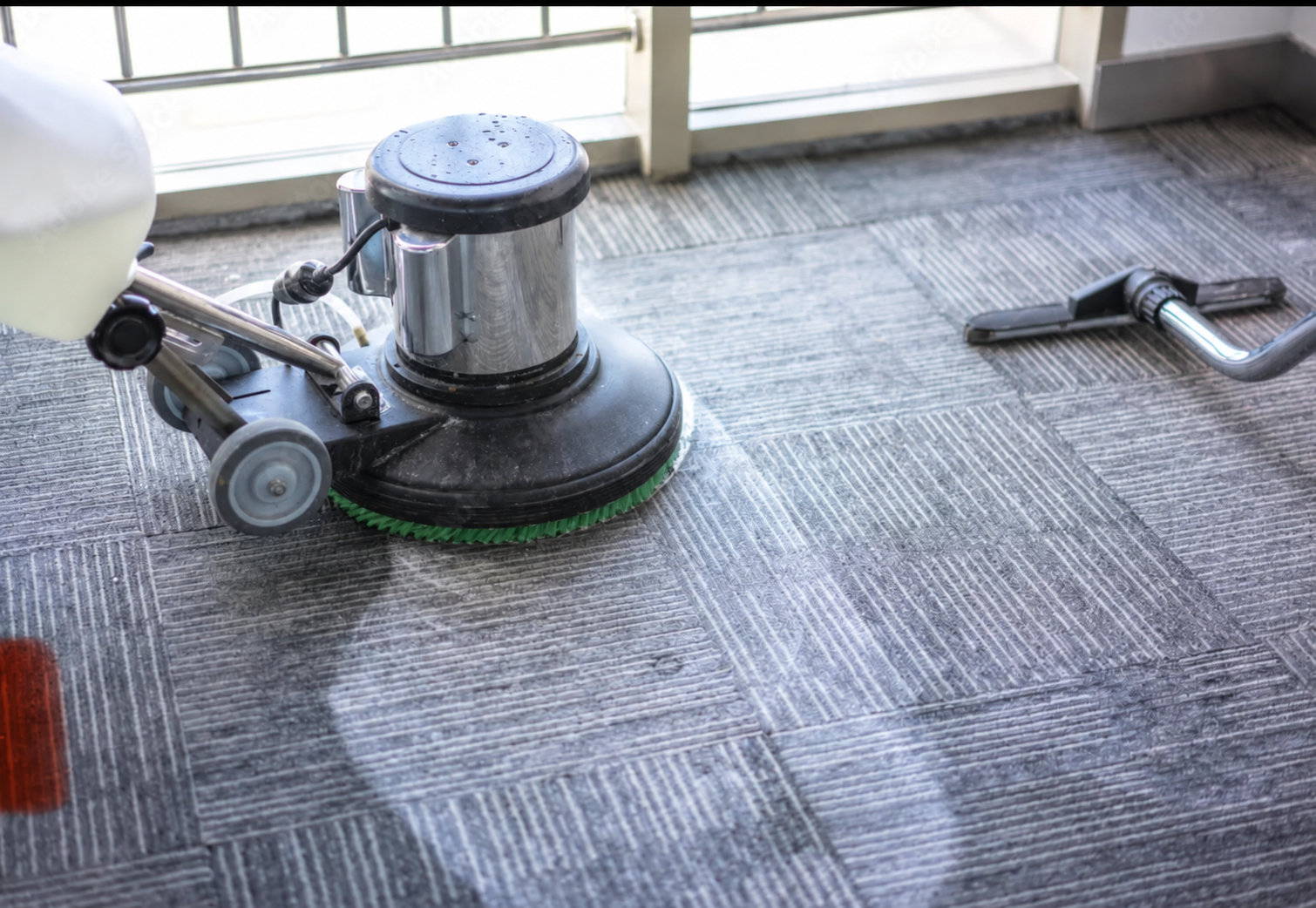 Rotary machine cleaning carpet with green brush bristles